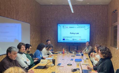 A room filled with participants taking notes at the workshop