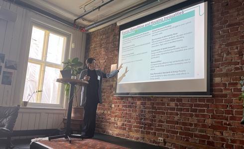 A researcher is giving a presentation at the ReHousIn Policy Lab workshop in Oslo